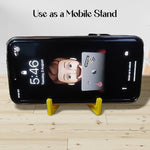Bulk set of 100 multicolor 2-in-1 plastic keychains with phone stands.