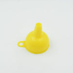 Bright yellow silicone funnel, a practical and colorful addition to any kitchen.