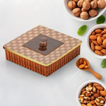 Airtight 4 compartment dry fruit box, perfect for organizing snacks.