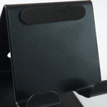 Front view of metal mobile and tablet stand showcasing compact and portable design