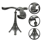 Front view of the balancing eagle toy and Eiffel Tower base, ready to adorn any desk or shelf.
