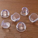 Child-proof corner guards protecting against sharp furniture edges.