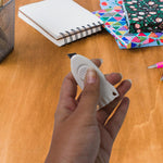 Mini Cloud Box Cutter held in hand for size reference