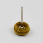 Close-up of the versatile abrasive buffing wheel set.