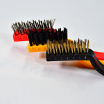 A person using the nylon mini wire brush to clean delicate areas without scratching.