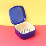Oblivion storage box featuring a removable draining tray for moisture control