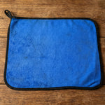 Lifestyle image of a clean glass surface wiped with microfiber cloth
