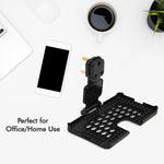 PHOBIA black mobile charging wall holder securely installed on a power socket.