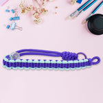 Person using a phone strap wrist lanyard, demonstrating secure and easy access.