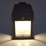 Waterproof plastic solar wall light mounted on exterior wall