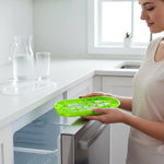 Green oval silicone ice cube mold for beverage and culinary use