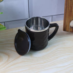Front view of insulated tea and coffee mug designed for hot beverage retention