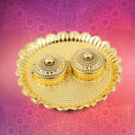 Close-up of the Kumkum holder plate, highlighting its intricate design details.