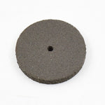 Detailed view of a single durable resin grinder cutting disc for metalwork.