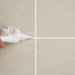 Freshly sealed tiled floor showing clean grout lines after application of the gap filler.