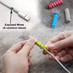 Multiple spiral cable protectors neatly installed on different charging cables.