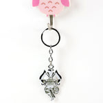 Detailed metal key ring featuring Trishul symbol on keychain