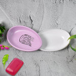 Top view of the slotted layer of the double layer soap holder, designed for quick drying.