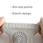 Grey wool knit knee guards designed for babies and toddlers' sensitive knees