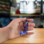 Durable plastic hook-style mobile stand holding smartphone upright