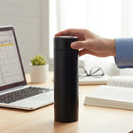 Lidded mug for hot beverages included in travel essentials combo set