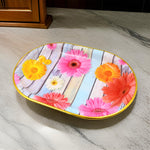 Rectangular floral plastic serving tray from a top-down view.