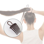 Side view of the Ponytail Comb angled to show the secure elastic loop and comb teeth.