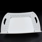 Foldable serving tray ready for use in a kitchen setting, perfect for everyday meals or outdoor gatherings.