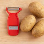Compact 2-in-1 slicer and peeler with ergonomic handle for easy use