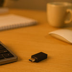 USB OTG adapter plugged into a tablet, demonstrating its plug-and-play functionality.