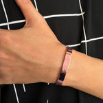 Close up detail of rose gold open cuff bracelet