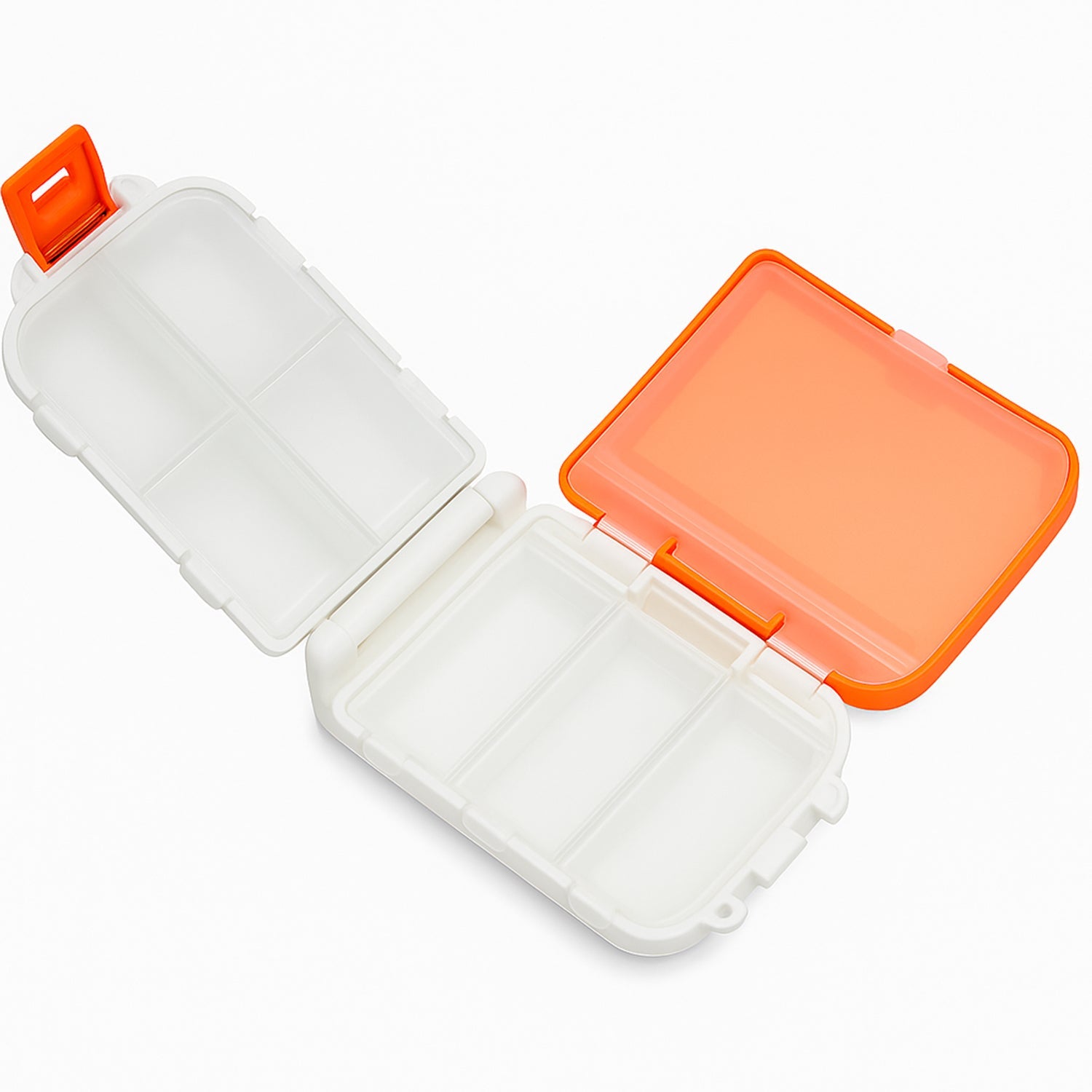 Top-down view of orange portable pill organizer with transparent lids