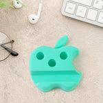 Bright apple-shaped desk organizer with phone holder and pen storage