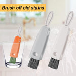 Compact 3-in-1 cleaning brush folded for easy storage and portability.