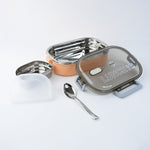 Lunch box featuring built-in spoon and adjustable divider