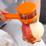 Top view of stainless steel peeler with container showing sharp blade