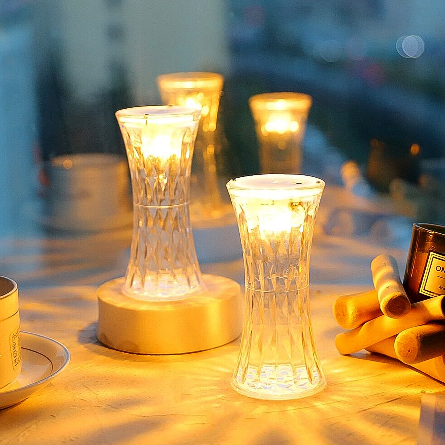 Crystal Night Light Lamp illuminating a bedside table in a bedroom.