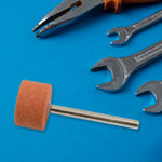 Close-up of a wool felt mounted polishing bit for intricate work.