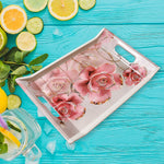 Plastic serving tray holding a cup and snack, ready for casual use.