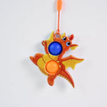 Detailed close-up of silicone bubbles on dragon fidget toy