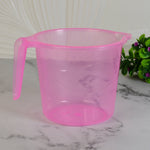 Versatile transparent bath water mug displayed from multiple angles, highlighting its practical design.