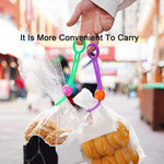 Compact reusable clip sealing a half-eaten food bag, preserving freshness.