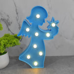 Decorative LED angel lamp on a bedside table, ideal as a thoughtful gift for girls.