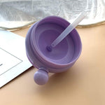 Multiple Whale Spray Sippy Cups in different colour variations, ready for playtime.