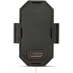 Mini LED strobe light securely mounted on a bicycle wheel, enhancing night-time visibility.