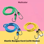 Multicolor bungee cord effectively tying down bulky luggage for travel.