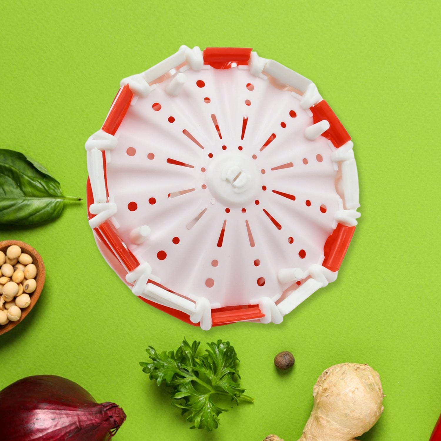 Close-up of the food-grade plastic and silicone folding fruit basket with drainage holes.
