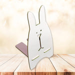 Another angle of the wooden rabbit mobile stand, highlighting its compact size.