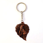 Close view of peepal leaf charm on Bal Krishna keychain