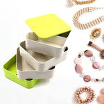 Elegant 4-layer Rotating Jewelry Box in white, ideal for storing earrings and rings.